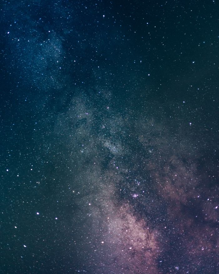 The Art of Drawing Readers In: Your attractive post title goes here A stunning vertical capture of the Milky Way galaxy, showcasing vibrant stars and cosmic beauty.